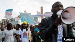 Congolese residents protest the deployment of a regional force which they see as ineffective in tackling resurgent rebels following renewed tensions around Goma in the North Kivu province of the Democratic Republic of Congo, Dec. 1, 2022. 
