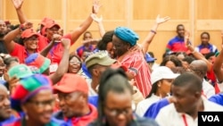 Delegates cheer at the 7th Swapo Party Congress as intra-party election results were being announced, in Windhoek, Namibia, Nov. 29, 2022. (Vitalio Angula/VOA)