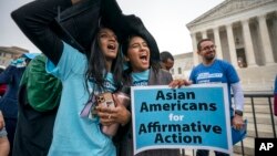 FILE - Students rally as the Supreme Court hears arguments on cases about affirmative action in admissions, in Washington, Oct. 31, 2022.