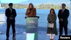In a screengrab from video, four Cabinet ministers are seen at a news conference in Vancouver, Nov 27, 2022, detailing Canada's new Indo-Pacific strategy.