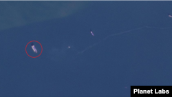 북한 서해 해상을 촬영한 19일 자 위성사진에 선박 2척이 붙어 있는 모습(원 안)이 보인다. 사진=Planet Labs