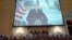 A video presentation plays as the House select committee investigating the Jan. 6 attack on the US Capitol holds its final meeting on Capitol Hill, Dec. 19, 2022. 