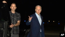 FILE - U.S. President Joe Biden arrives at Henry E. Rohlsen Airport, in St. Croix, U.S. Virgin Islands, Dec. 27, 2022. Two days later, while still in the Virgin Islands with his wife and family, the president signed a $1.7 trillion spending bill to keep the government operating.