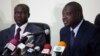 Mbacke Fall (R), head of the Extraordinary African Chambers, a special court set up this year by Senegalese authorities in agreement with the African Union, speaks to journalists at a news conference in Dakar, July 1, 2013.