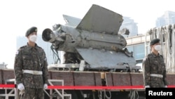 Debris of a North Korean missile salvaged from South Korean waters that was identified as parts of a Soviet-era SA-5 surface-to-air missile is seen at the Defense Ministry in Seoul, South Korea, November 9, 2022. (Yonhap via REUTERS)