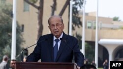 Lebanon's outgoing President Michel Aoun delivers a speech to mark the end of his mandate, outside the presidential palace in Baabda, east of the capital Beirut, on October 30, 2022. 