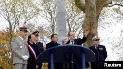 French President Emmanuel Macron attends a ceremony in tribute to French soldiers killed on Aug. 1914 during border battles, in Morhange, Eastern France, Nov. 5, 2018 as part of a World War I commemoration tour. 