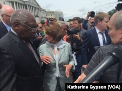 From left, Congressman James Clyburn and House Minority Leader Nancy Pelosi on the Capitol steps, June 23, 2016. After ending their sit-in on the House floor, House Democrats went outside to thank supporters who had gathered.