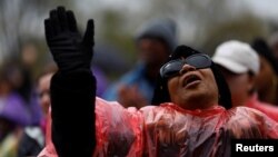 An attendee is seen during a march and rally on the National Mall to mark the 50th anniversary of the assassination of civil rights leader Martin Luther King Jr. in Washington, April 4, 2018. 