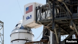 A United Launch Alliance Atlas V rocket stands on the pad after the launch of two astronauts aboard Boeing's Starliner-1 Crew Flight Test was delayed for technical issues prior to a mission to the International Space Station, in Cape Canaveral, Florida, May 7, 2024.