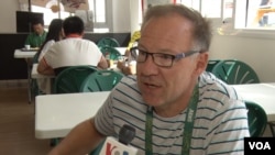 Dirk Gerlo is a Belgian radio and TV reporter who has covered eight Olympics. (P. Brewer/VOA)