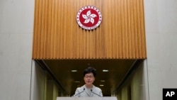 Hong Kong Chief Executive Carrie Lam speaks during a press conference in Hong Kong, Tuesday, Nov. 26, 2019.