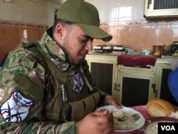 Ramen Khoshaba, a fighter with the Christian militia Dwekh Nawsha. (S. Behn/VOA)