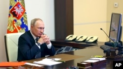 Ruski predsednik Vladimir Putin na sednici Saveta bezbednosti (Foto: Sergei Ilyin, Sputnik, Kremlin Pool Photo via AP)