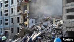 A view shows a residential building heavily damaged by a Russian missile strike in Zaporizhzhia, Ukraine, Oct. 9, 2022.