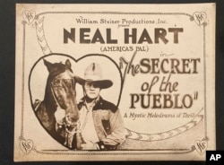 A movie theater lobby card promotes the 1923 silent film "The Secret of the Pueblo." (Photo Courtesy Dwight Cleveland via AP)
