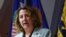 FILE - U.S. Deputy Attorney General Lisa Monaco speaks in Washington, May 6, 2022. She and other U.S. officials say entities and businesses need to take steps to protect against potential attacks in cyberspace.