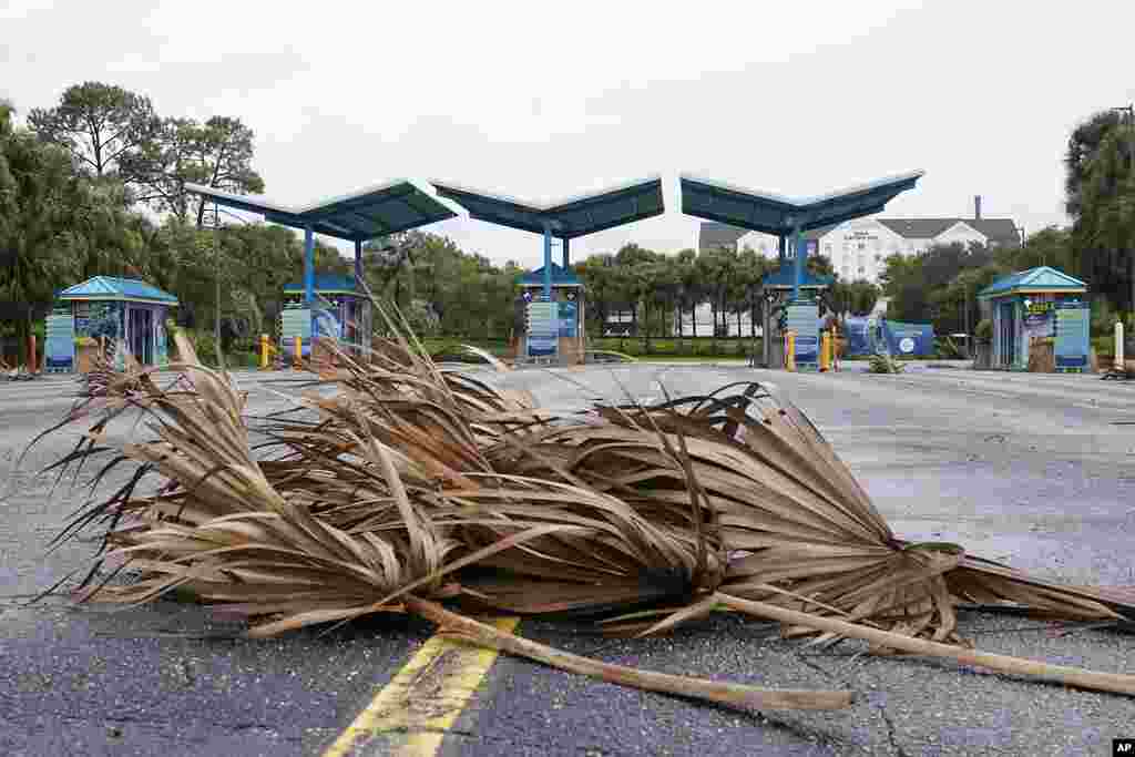 The entrance to the Sea World theme park is seen as Hurricane Ian bears down on Florida, Sept. 28, 2022, in Orlando. The park shut ahead of the storm.