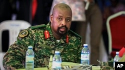 FILE - Then Lt. Gen. Muhoozi Kainerugaba, son of Uganda's President Yoweri Museveni, attends a ceremony in Entebbe, Uganda, May 7, 2022.