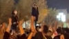 Clashes in Iran as Protests Over Woman’s Death Persist 
