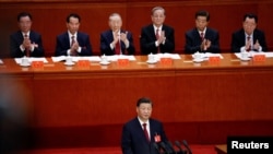 ប្រធានាធិបតី​ចិន​លោក Xi Jinping ចូលរួម​ក្នុង​ពិធី​បើក​សមាជ​ជាតិ​លើក​ទី ២០ នៃ​បក្ស​កុម្មុយនីស្ត​ចិន​នៅ​ក្នុង​សាល Great Hall of the People នៅ​ទីក្រុង​ប៉េកាំង កាលពី​ថ្ងៃទី១៦ ខែតុលា ឆ្នាំ២០២២។