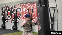 Hawa Haidari works out at a gym in Washington state with the goal of fighting in a ring and being the first Afghan woman to win a mixed martial arts tournament. (Carolyn Presutti/VOA)