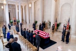 hief Justice of the US Supreme Court, John Roberts, speaks during a private ceremony for Justice Ruth Bader Ginsburg at the Supreme Court in Washington, DC, on September 23, 2020.
