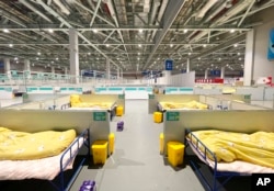A makeshift hospital for COVID-19 patients is seen at the National Exhibition and Convention Center in Shanghai, April 12, 2022. (Xinhua News Agency via AP)