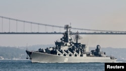 FILE - The Russian Navy's guided missile cruiser Moskva sails in the Bosphorus, on its way to the Mediterranean Sea, in Istanbul, June 18, 2021.