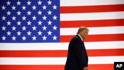 President Donald Trump arrives to speak during a tour of Puritan Medical Products medical swab manufacturing facility, June 5, 2020, in Guilford, Maine. 