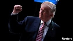 Supporters of Republican U.S. presidential nominee Donald Trump reacts at a campaign rally in Panama City, Florida, Oct. 11, 2016. 