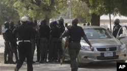 An ice cream vendor cycles past a huge fallen tree after an onslaught of Typhoon Rammasun, (locally named Glenda) in Batangas city south of Manila, July 17, 2014. 