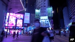 A nearly deserted street during the coronavirus pandemic in Hong Kong's Causeway Bay area on March 10, 2022. (AP Photo/Vincent Yu)