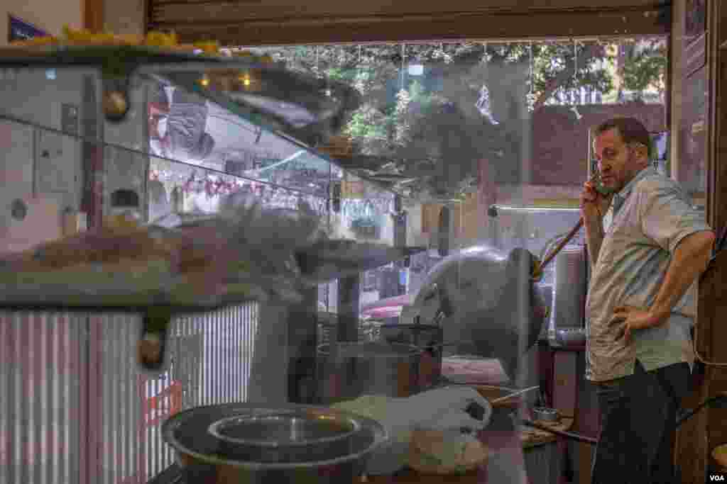 Mohamed, a restaurant owner, says, “I’ve removed items from my menu that require a lot of frying or chilies” because his customers can no longer afford dishes that require lots of oil or vegetables like chilis, which in some places are six times more expe