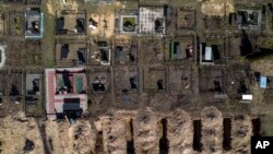 Groblje u Buči (Foto: AP/Rodrigo Abd)