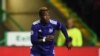 Anderlecht's Nigerian striker Henry Onyekuru runs with the ball during the UEFA Champions League Group B football match between Celtic and Anderlecht at Celtic Park stadium in Glasgow, Scotland on December 5, 2017. (Photo by Andy BUCHANAN / AFP)