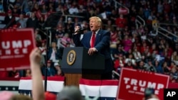 FILE - President Donald Trump speaks during a campaign rally at Bojangles Coliseum, in Charlotte, North Carolina, March 2, 2020.