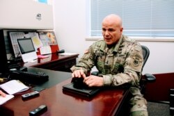 FILE - Major General Roger Cloutier, head of the U.S. Army Africa command, speaks to AFP at the Pentagon, outside Washington, Dec. 4, 2018.