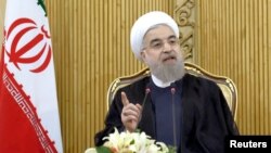 Iranian President Hassan Rouhani speaks in Tehran after returning from the annual United Nations General Assembly, Sept. 29, 2015. 