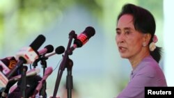 FILE - Myanmar's National League for Democracy Party leader Aung San Suu Kyi is seen speaking to media in Yangon.