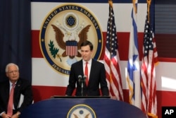 White House senior adviser Jared Kushner, right, speaks as U.S. Ambassador to Israel David Friedman listens during the opening ceremony of the new U.S. embassy in in Jerusalem, May 14, 2018.