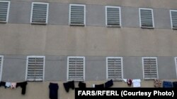 FILE - An exterior view of Evin prison, which is thought to hold hundreds of political prisoners as well as regular inmates, in Tehran, Iran. 