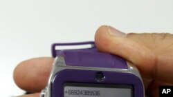 This May 8, 2016 photo by Asst. Prof. Pakarat Jumpanoi shows a smartwatch used by students caught cheating in exams for admission to medical school in Bangkok, Thailand.