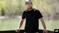 Daniel Roberts poses for a picture Monday, April 5, 2021, in McMinnville, Tenn. Roberts received a COVID vaccine over the objections of his family, who are against being vaccinated. 