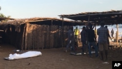 Wurin da aka kai hari ana kwashe gawarwaki jiya Lahadi