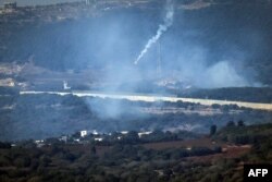 ផ្សែងហ៊ុយឡើងនៅ​ភូមិ Aita al-Shaab នៃប្រទេសលីបង់ ដែលស្ថិតនៅជាប់​ព្រំដែនអ៊ីស្រាអែល ក្នុងអំឡុងនៃការប្រយុទ្ធគ្នា​រវាង​អ៊ីស្រាអែល​និង​ក្រុម​ Hezbollah កាលពីថ្ងៃទី ២៨ ខែតុលា ឆ្នាំ​២០២៣។