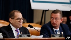 House Judiciary Committee Chairman Rep. Jerrold Nadler, D-N.Y., left, gives his closing statement as ranking member Rep. Doug Collins, R-Ga., listens during the House Judiciary Committee hearing on the constitutional grounds for the impeachment of…