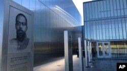 A marker commemorating the service of Sgt. William Carney, a former slave and the first African American Medal of Honor recipient, is displayed outside the new National Museum of the United States Army on Nov. 10, 2020, in Fort Belvoir, Va. (AP Photo/Matthew Barakat)