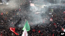 Mourners attend a funeral ceremony for Iranian Gen. Qassem Soleimani and his comrades, who were killed in Iraq in a U.S. drone strike on Friday, at the Enqelab-e-Eslami (Islamic Revolution) square in Tehran, Iran, Jan. 6, 2020. 