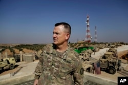 U.S. Army Lt. Gen. Paul E. Funk speaks to the Associated Press at an American outpost in the northern Kurdish town of Manbij, Syria, Feb. 7, 2018.